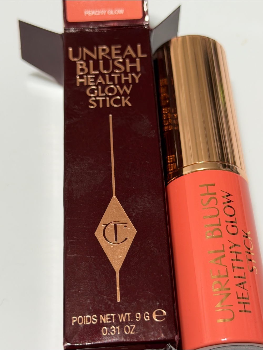 Charlotte Tilbury Unreal Blush Healthy Glow Stick — Peony Glow (Coral-Peach)